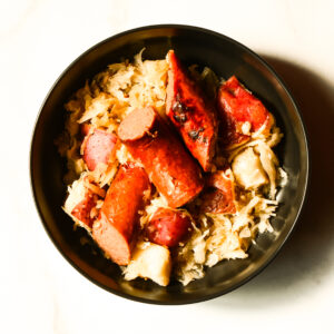 A Night @ The Salisbury: Cooked sausage pieces served with sauerkraut and potato chunks.