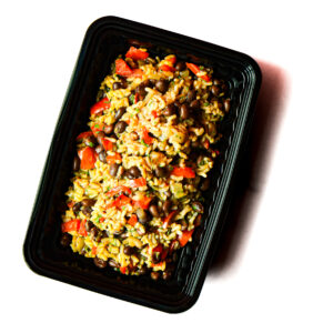 Operation Cajun Fit, a black plastic container with rice, black beans, red bell peppers, and veggies, on a white background.