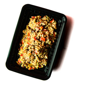Operation Cajun Fit is a black plastic container with mixed rice, ground meat, red bell peppers, beans, and vegetables.
