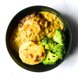 BeefZilla: Salisbury steak with brown gravy, mashed potatoes, and steamed broccoli in one hearty bowl.