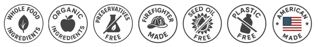 A row of six circular icons highlights whole food ingredients, organic ingredients, weight-loss benefits, firefighter made, plastic free, and American made—perfect for healthy meal delivery.