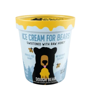 A pint of Dough Bear ice cream, launching in 2026, sweetened with raw honey and grass-fed dairy, with a bear graphic and no refined sugars.